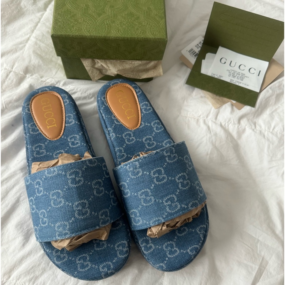 Gucci Slides never worn. They were a gift and too big.